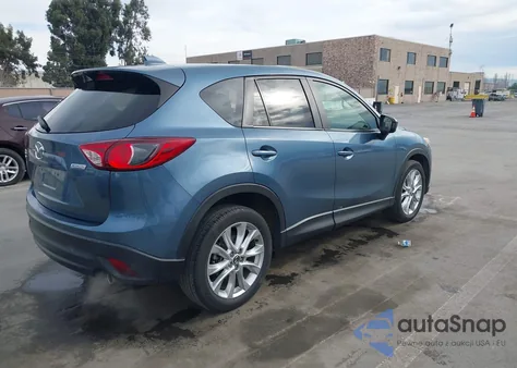 2015 Mazda Cx-5 Grand Touring z USA, uszkodzony, nr VIN JM3KE4DY9F0458976